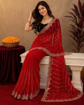Red  soft net sequence emboidery saree with unstitched blouse piece 4