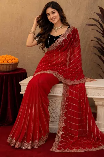 Red  soft net sequence emboidery saree with unstitched blouse piece