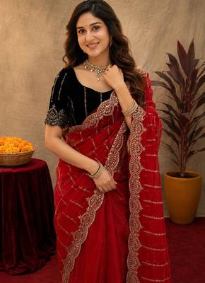 Red  soft net sequence emboidery saree with unstitched blouse piece 5