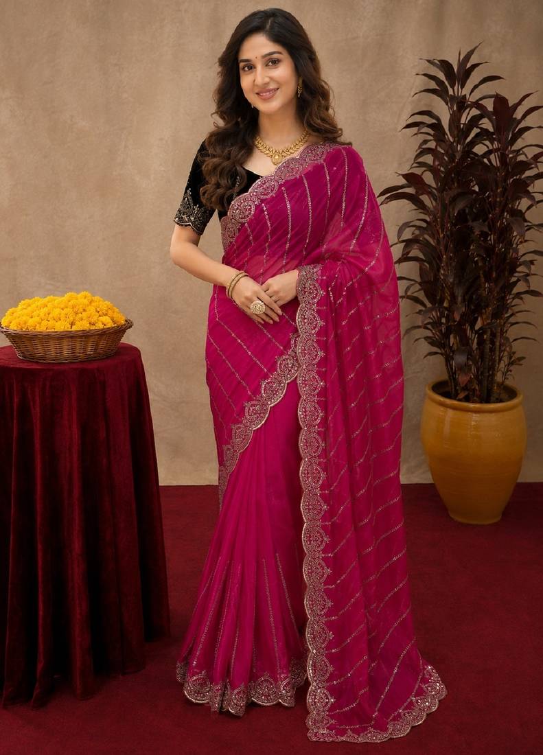 Rani pink  soft net sequence emboidery saree with unstitched blouse piece