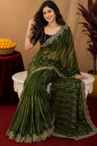 Green  soft net sequence emboidery saree with unstitched blouse piece
