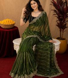 Green  soft net sequence emboidery saree with unstitched blouse piece