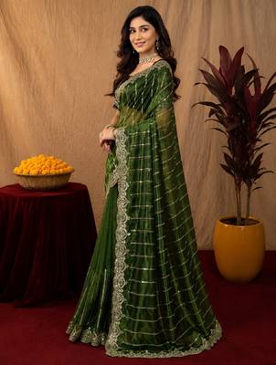 Green  soft net sequence emboidery saree with unstitched blouse piece 3
