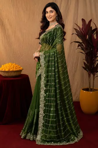Green  soft net sequence emboidery saree with unstitched blouse piece