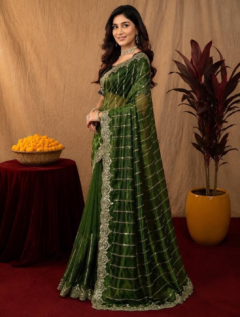 Green  soft net sequence emboidery saree with unstitched blouse piece