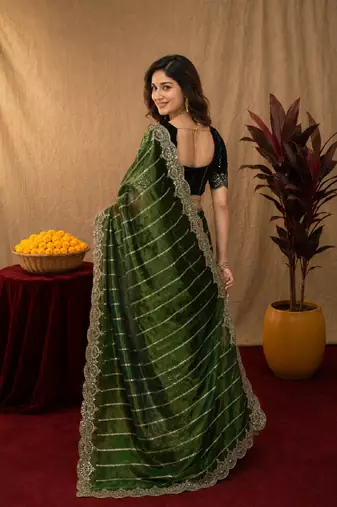 Green  soft net sequence emboidery saree with unstitched blouse piece