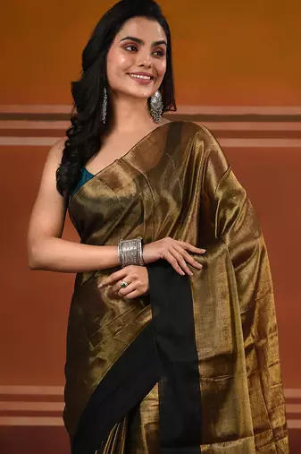 Golden tissue soft saree with pompom