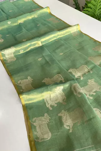 green coloer Zari All Over Pichwai Pattern Tilak Butti Motifs tissue saree