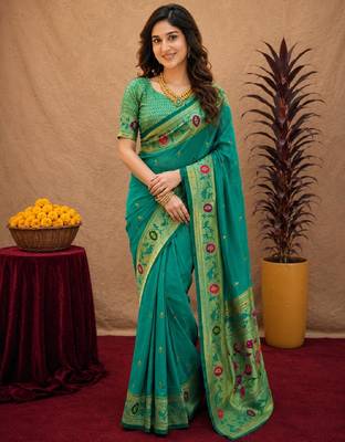 Teal green soft silk blend banarasi jacuard work pethani saree with unstitched blouse piece 1