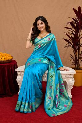 Turquoise soft silk blend banarasi jacuard work pethani saree with unstitched blouse piece 1