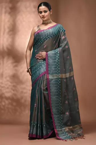 Teal coloured handwoven tissue saree with woven design