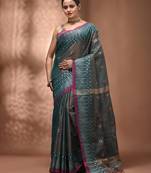 Teal coloured handwoven tissue saree with woven design