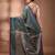 Teal coloured handwoven tissue saree with woven design