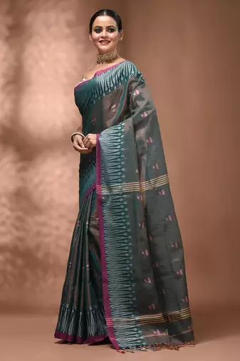 Teal coloured handwoven tissue saree with woven design