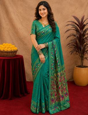 Teal green soft silk blend banarasi jacuard work pethani saree with unstitched blouse piece 1