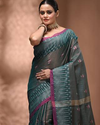 Teal coloured handwoven tissue saree with woven design 5