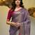 Purple tissue soft saree with zari borders