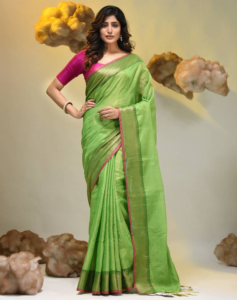 Green tissue soft saree with zari borders