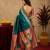 Teal blue soft silk blend banarasi jacuard work pethani saree with unstitched blouse piece