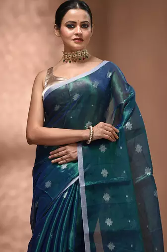 Peacock blue texture motifs tissue saree with stripes pallu
