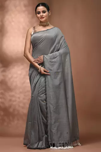 Elegant grey cotton saree with sequin embellishments and pom pom