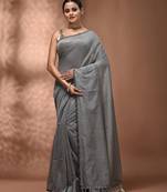 Elegant grey cotton saree with sequin embellishments and pom pom