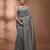 Elegant grey cotton saree with sequin embellishments and pom pom