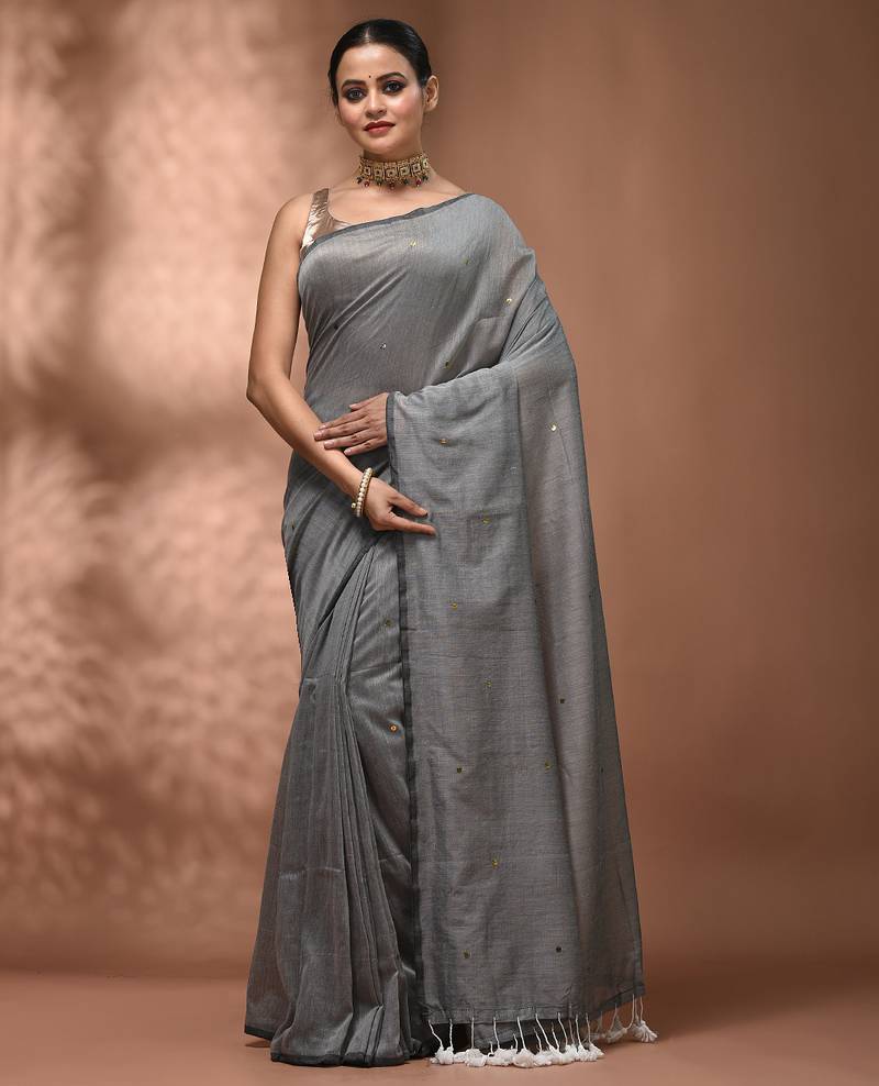Elegant grey cotton saree with sequin embellishments and pom pom