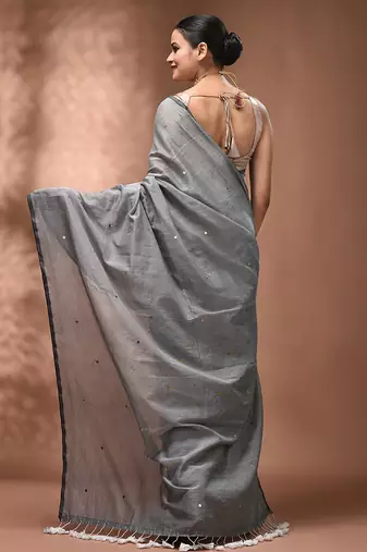 Elegant grey cotton saree with sequin embellishments and pom pom