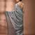Elegant grey cotton saree with sequin embellishments and pom pom