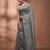Elegant grey cotton saree with sequin embellishments and pom pom