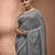 Elegant grey cotton saree with sequin embellishments and pom pom