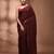 Elegant maroon cotton saree with sequin embellishments and pom pom