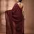 Elegant maroon cotton saree with sequin embellishments and pom pom