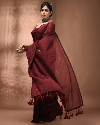 Elegant maroon cotton saree with sequin embellishments and pom pom 3