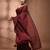 Elegant maroon cotton saree with sequin embellishments and pom pom