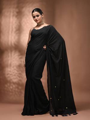 Elegant black cotton saree with sequin embellishments and pom pom 1