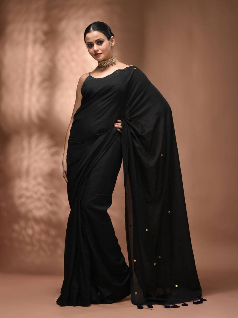 Elegant black cotton saree with sequin embellishments and pom pom