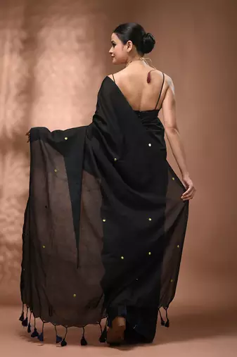 Elegant black cotton saree with sequin embellishments and pom pom