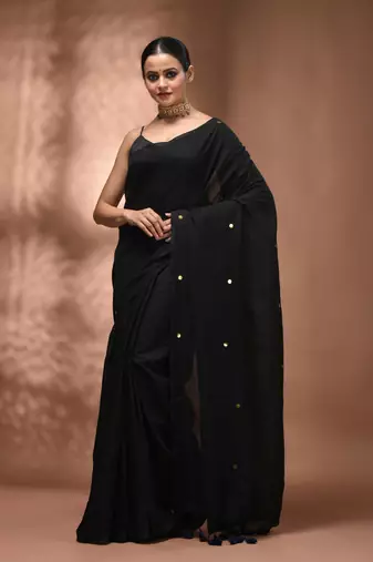 Elegant black cotton saree with sequin embellishments and pom pom