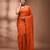 Elegant orange cotton saree with sequin embellishments and pom pom