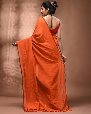 Elegant orange cotton saree with sequin embellishments and pom pom 2