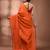 Elegant orange cotton saree with sequin embellishments and pom pom