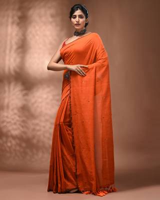 Elegant orange cotton saree with sequin embellishments and pom pom 3