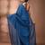 Elegant sapphire blue cotton saree with sequin embellishments and pom pom