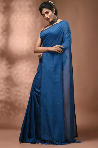 Elegant sapphire blue cotton saree with sequin embellishments and pom pom