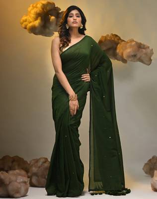 Elegant green cotton saree with sequin embellishments and pom pom 3