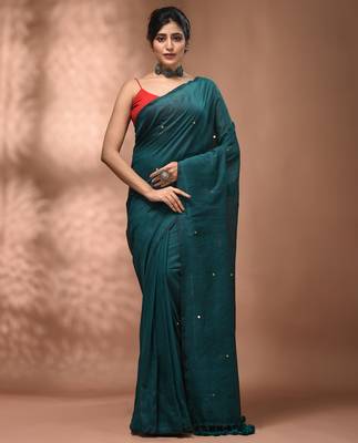 Elegant teal cotton saree with sequin embellishments and pom pom 1