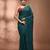 Elegant teal cotton saree with sequin embellishments and pom pom