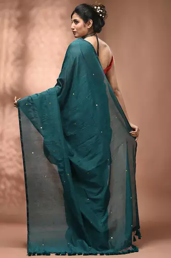 Elegant teal cotton saree with sequin embellishments and pom pom